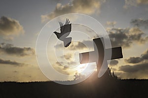 Silhouette Jesus christÂ deathÂ on cross crucifixion on calvary hill in sunset good friday risen in easter day concept for